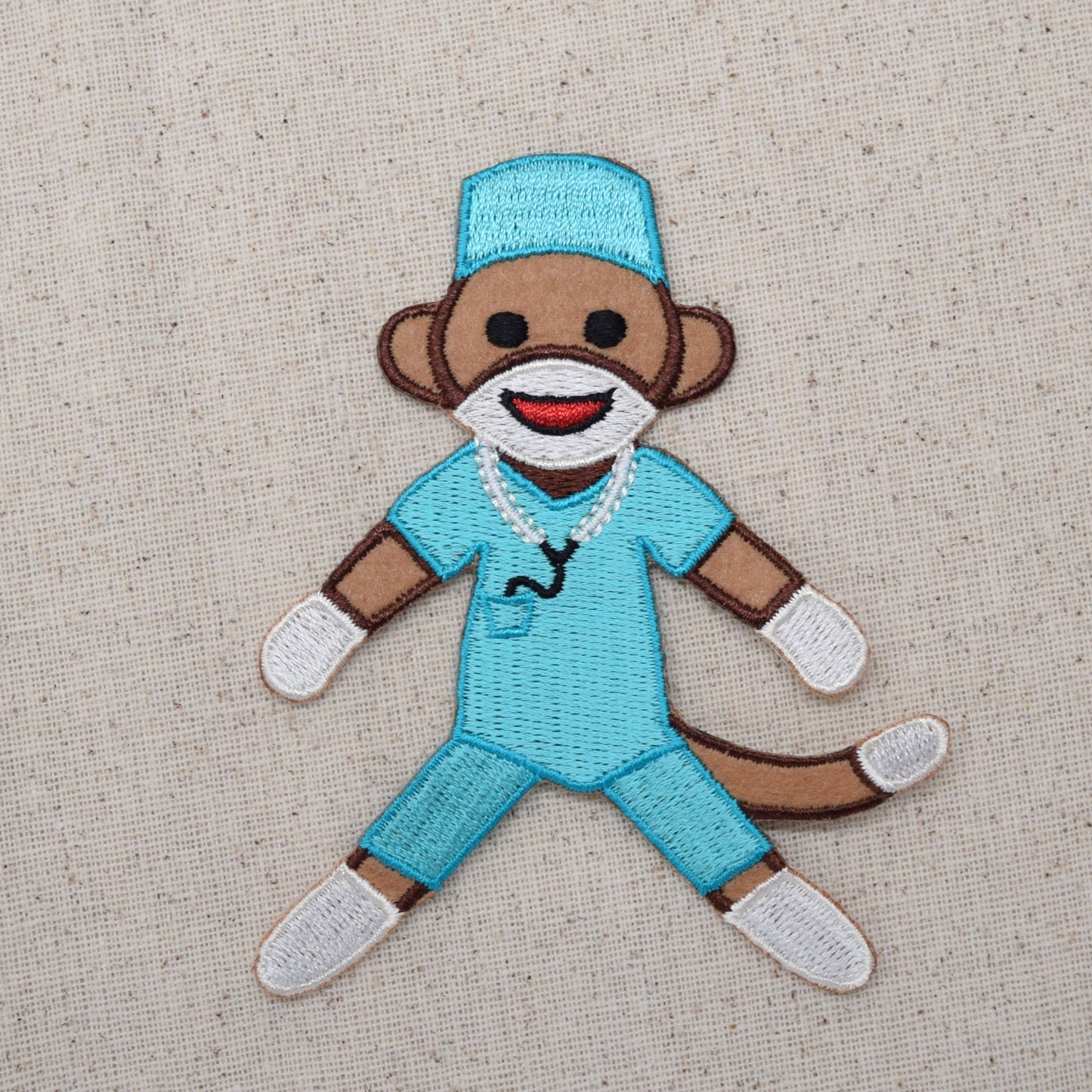 Sock Monkey Wearing Teal Scrubs - Iron on Patch